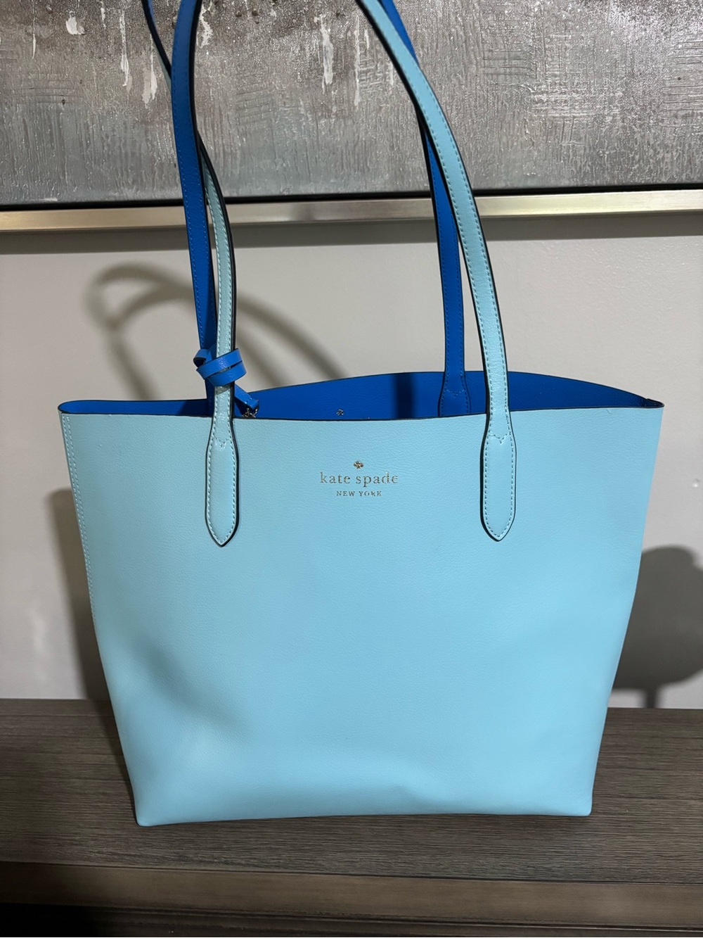 Kate Spade Reversible light blue exterior with bright blue interior leather tote
